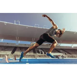 Fototapeta Sprinter – Dynamika Biegu na Stadionie