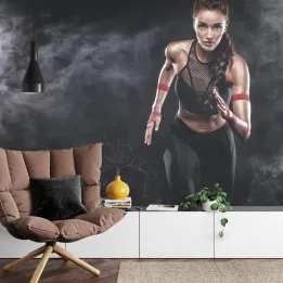 Fototapeta Wysportowana Biegaczka – Motywacja Sportowa i Zdrowy Tryb Życia