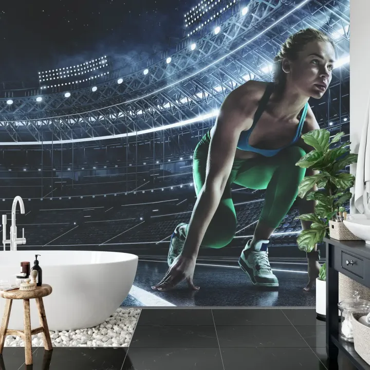 Fototapeta Sprinterka – Dynamika Biegu na Stadionie