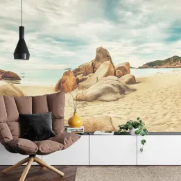 Fototapeta Plaża – Nadmorski Krajobraz z Skałami i Chmurami