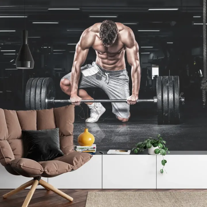 Fototapeta Kulturysta Ze Sztangą – Motywacja Sportowa na Siłownię