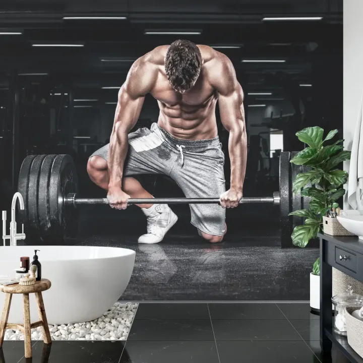 Fototapeta Kulturysta Ze Sztangą – Motywacja Sportowa na Siłownię