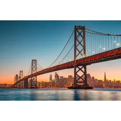 Fototapeta San Francisco – Skyline i Most Oakland Bay o Zachodzie Słońca