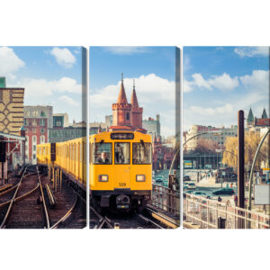 Obraz Wieloczęściowy Żółty Pociąg W Berlinie Na Torach Kolejowych - aranżacja