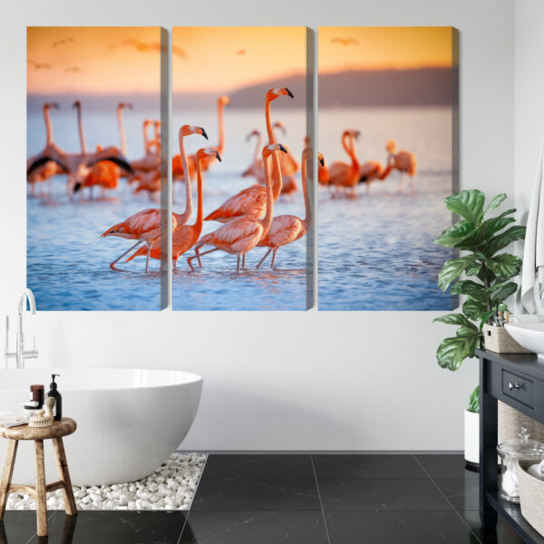 Obraz Wieloczęściowy Stado Flamingów Nad Wodą - aranżacja mieszkania